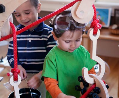 Two boys playing on exhibit at Children's Museum Boca Raton