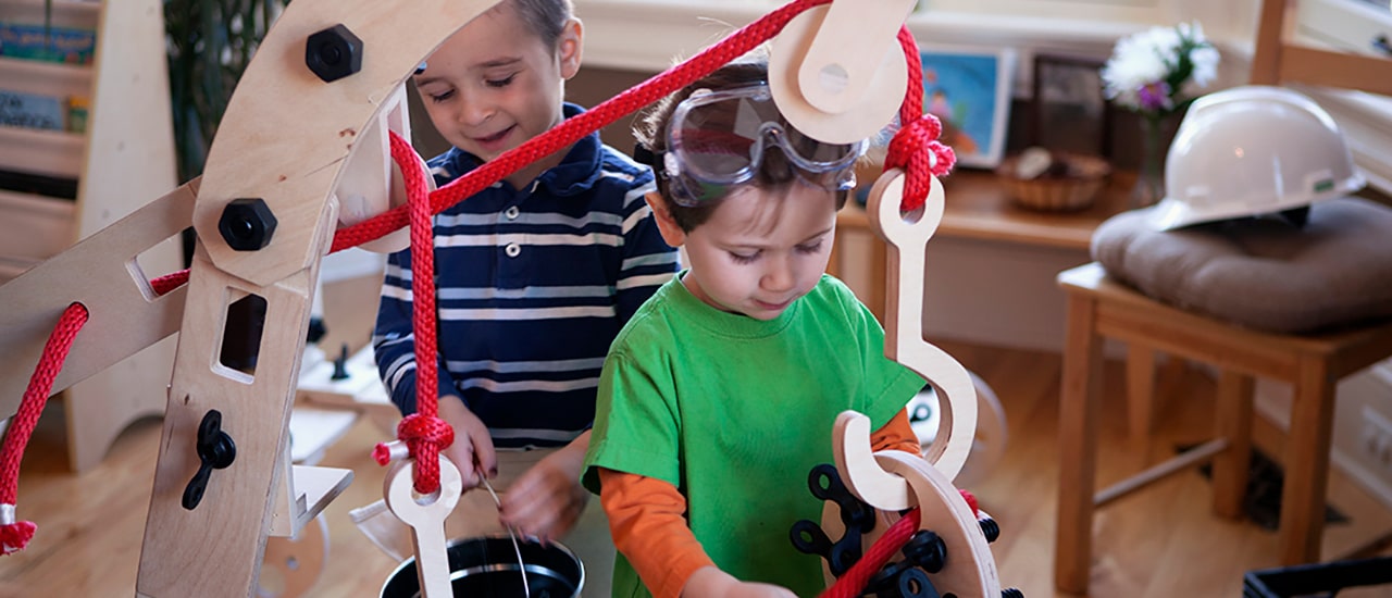 Two boys playing on exhibit at Children's Museum Boca Raton