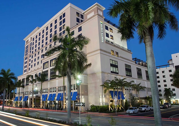 Hyatt Place Boca Raton Streetview with bright blue sky behind