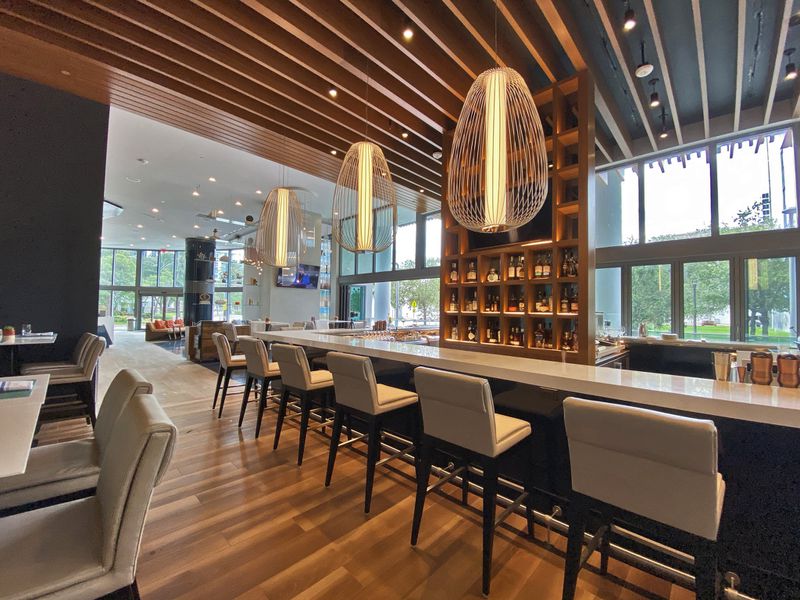 Harborwood Urban Kitchen + Bar, specializing in upscale American cuisine, is the ground-floor restaurant of the recently opened, 46-story Hyatt Centric Las Olas hotel