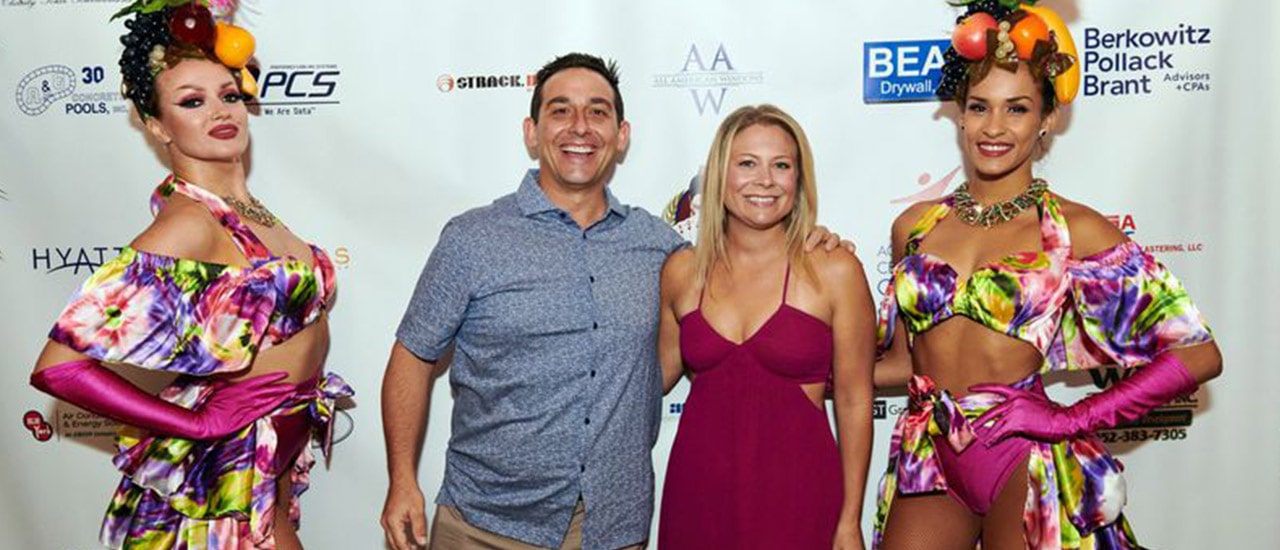 Jonah and Emily Elisco party at the 2019 Kolter|Kast Havana Nights Charity Poker event