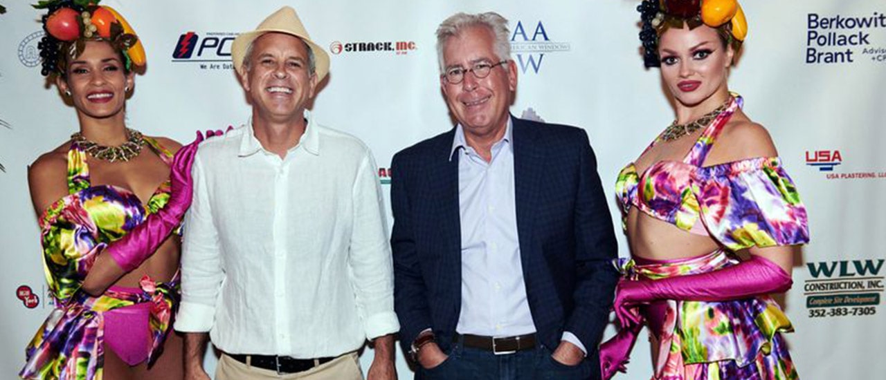 2 Men and 2 women in costume at Kast Havana Nights Charity Poker Event