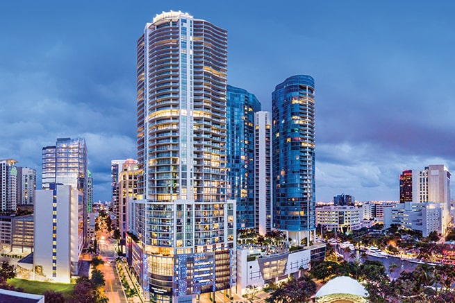 exterior of the hyatt centric at night on las olas blvd in downtown fort lauderdale